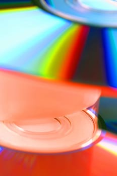 CDs and DVDs on a white background
