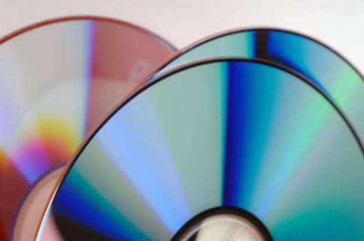 CDs and DVDs on a white background