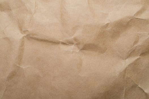 Crumpled parchment. packing paper texture. uneven carton background