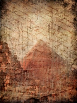 Egyptian pyramid and vintage manuscript on grunge background