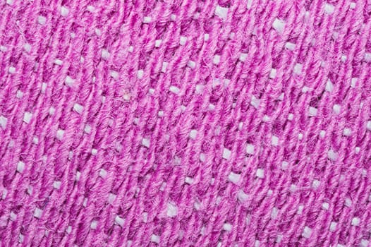 Pink fabric texture. knitted textile background. woven material close up