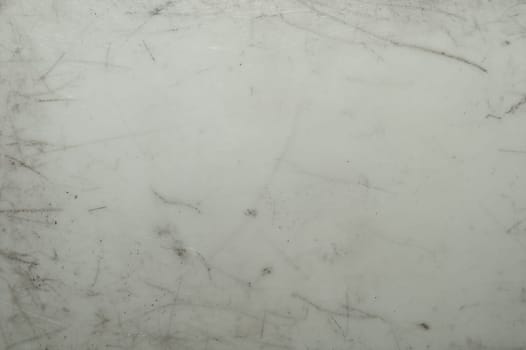 Scratched plastic texture. gray surface background
