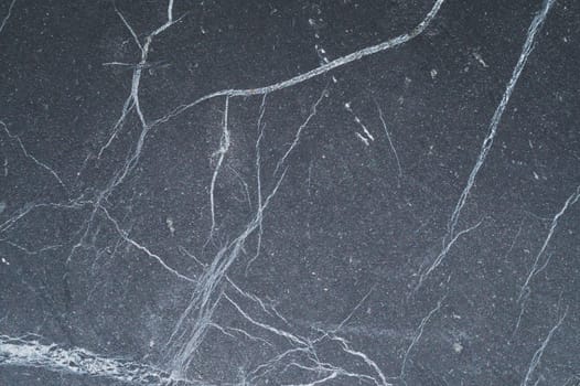Carbon stone gray texture. flat scratched surface. geological background