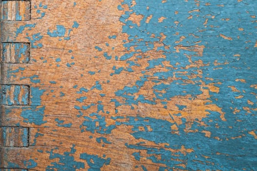 Wooden texture with cracked paint. shabby wood background close up