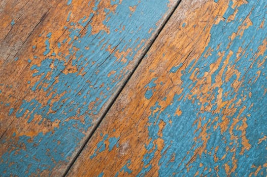 Wooden texture with cracked paint. shabby wood background close up