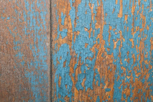 Wooden texture with cracked paint. shabby wood background close up