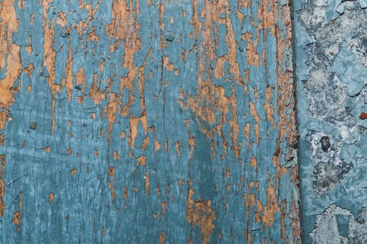 Wooden texture with cracked paint. shabby wood background close up