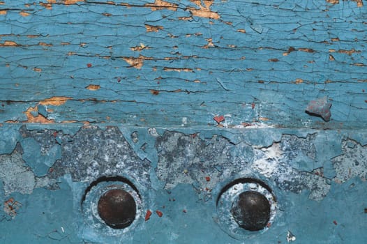 Wooden texture with cracked paint. shabby wood background close up