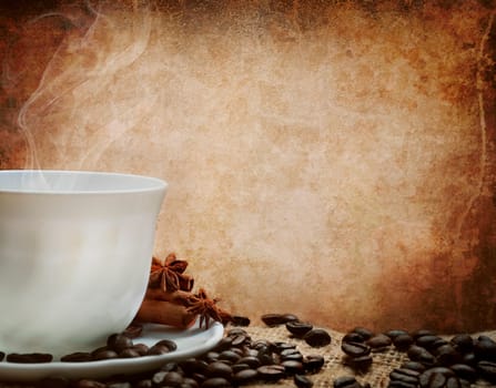 White coffee cup in front of a grunge wall