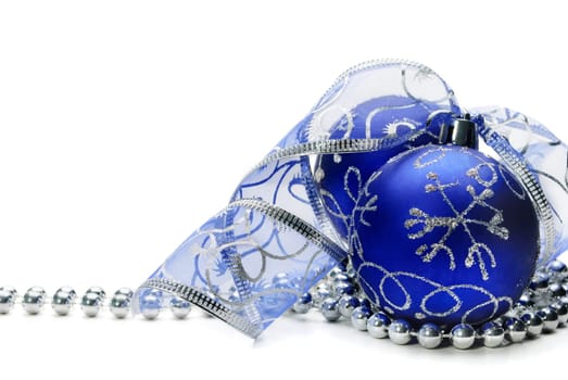 Blue christmas ornament on white background
