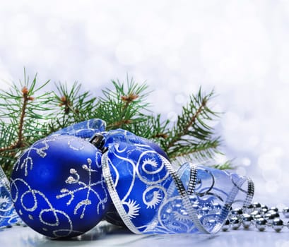 Blue christmas ornament with bokeh background