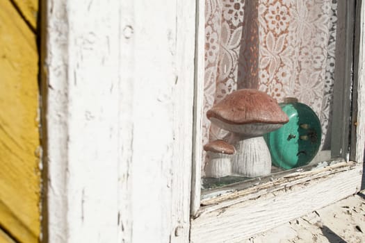 simple old window of old wooden house closeup