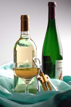 bottles with wine on a white background
