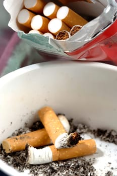 different types of cigarettes on a white background