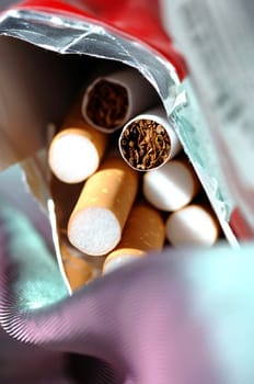 different types of cigarettes on a white background