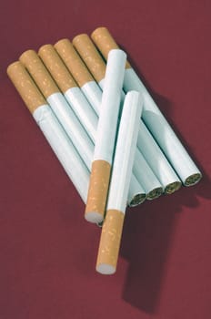 different types of cigarettes on a white background