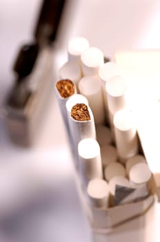 different types of cigarettes on a white background