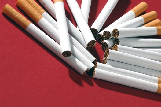 different types of cigarettes on a white background