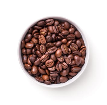 Coffee beans in white bowl isolated over white background. Top view