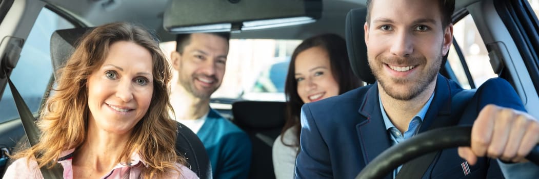 Group Of Happy Friends Having Fun In The Car