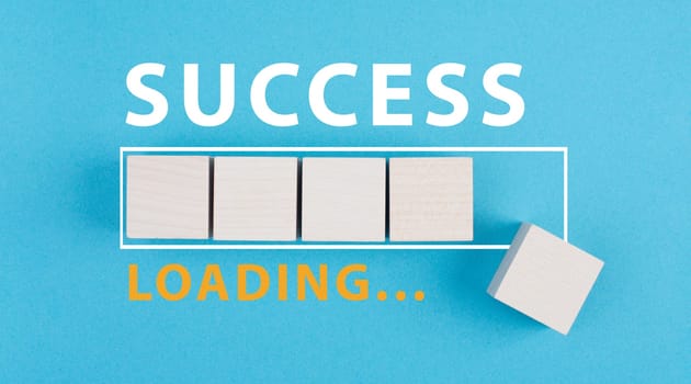Loading bar with the word success, blue colored background, business concept, improvement