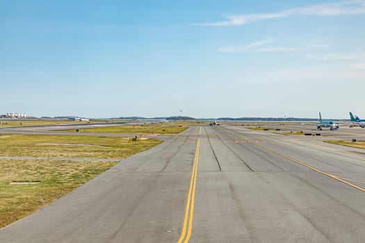 runway with aircraft at Boston international airport, USA