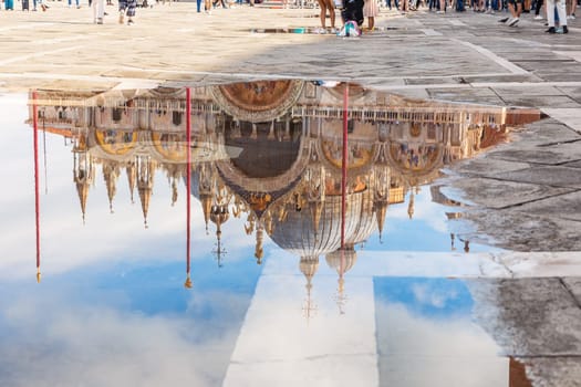 St Mark's Basilica, water reflection view, Venice, Italy.