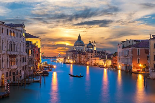 Grand Canal of Venice with a lonely gandolier at sunset, Italy.