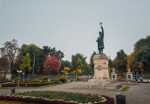 Stephen III The Great monument (Stefan cel Mare statue) in front of the park in a rainy autumn day, Chisinau city, Moldova.