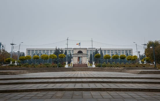 View from the square of the Triumphal Arch in front of the government building, Chisinau, Moldova. Historical landmarks of the capital city..