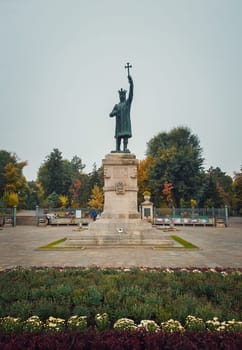 Stephen III The Great monument (Stefan cel Mare statue) in front of the park in a rainy autumn day, Chisinau city, Moldova..