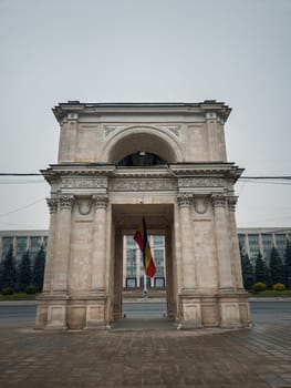 Close up view to the Triumphal Arch in front of the government building, Chisinau, Moldova. Historical landmarks of the capital city