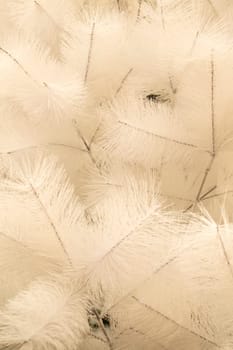 Faux Christmas tree. White fluffy christmas tree branches Artificial white branch pattern. Vertical image