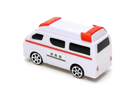 Japanese toy ambulance car isolated on white background, Translation: "Fire department"""