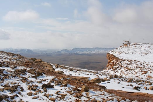 Mitzpe Ramon next to the crater Machtesh Ramon covered in snow, Negev desert in winter time, Israel