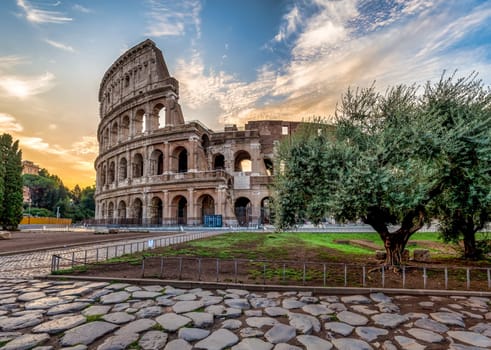Detail of Colosseum in Rome (Roma), Italy. Also named Coliseum, this is the most famous Italian sightseeing. Spectacular blue sky in background.