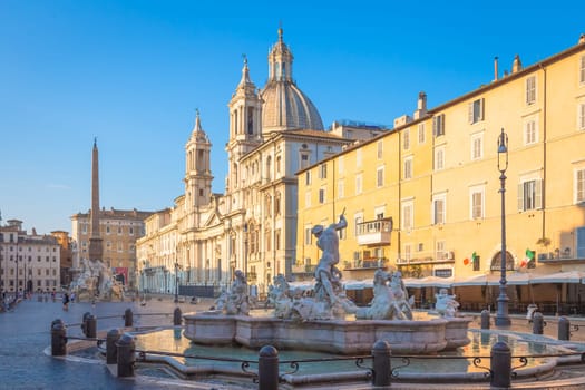 ROME, ITALY - CIRCA AUGUST 2020: Sunrise light on Piazza Navona (Navona Square) buildings