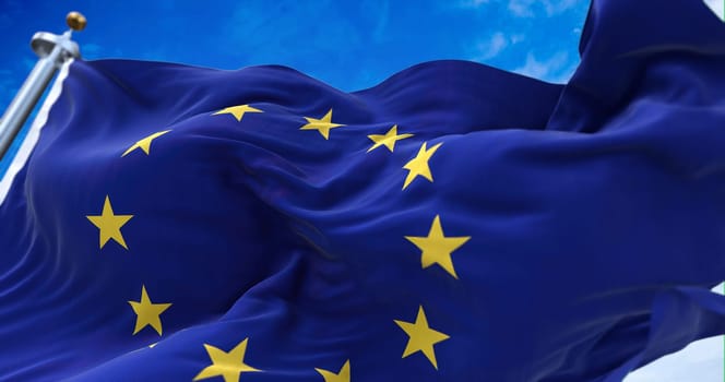 The flag of The European Union flapping in the wind. Economic and finance Community. Politics and Economy. Transnational political government