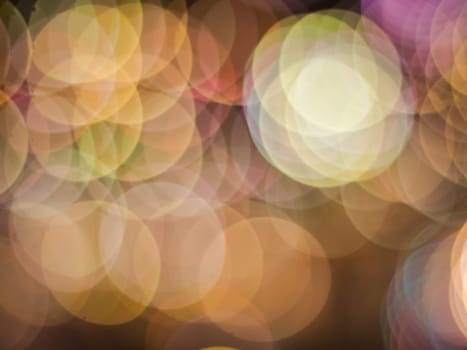 Colorful blur light hexagon bokeh background. Abstract Christmas festival defocused background.