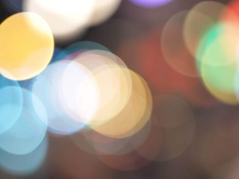 Colorful blur light hexagon bokeh background. Abstract Christmas festival defocused background.