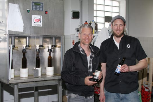 Master brewer Simon Siemsgluess,Steffen Wink,presenter for the RTL NITRO magazine BEEF! The Tv Magazine,Hamburg,20.04.2015