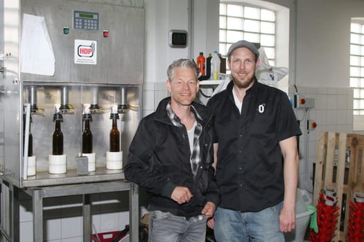 Master brewer Simon Siemsgluess,Steffen Wink,presenter for the RTL NITRO magazine BEEF! The Tv Magazine,Hamburg,20.04.2015