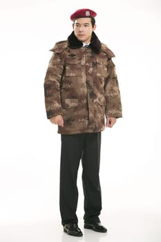Create all kinds of work clothes policeman stands in front of a white background