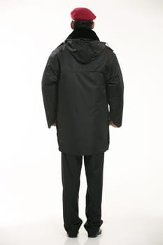 Create all kinds of work clothes policeman stands in front of a white background