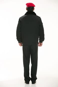 Create all kinds of work clothes policeman stands in front of a white background