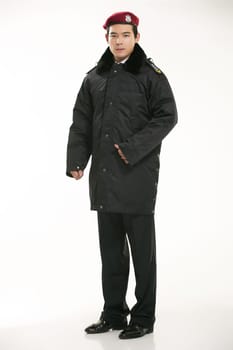 Create all kinds of work clothes policeman stands in front of a white background