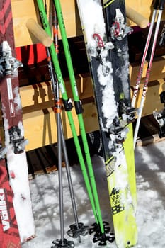 Skis by mountain chalet