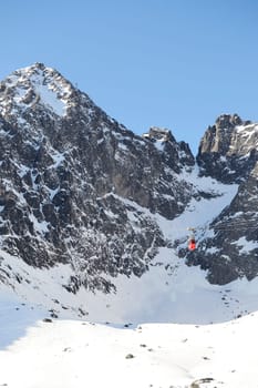 Mountains in winter with cable car