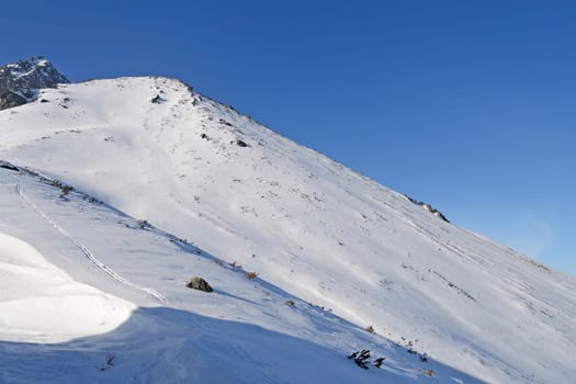 Mountains in winter with cable car