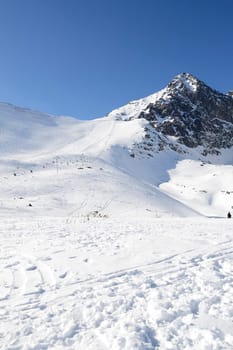 Mountains in winter with ski lift